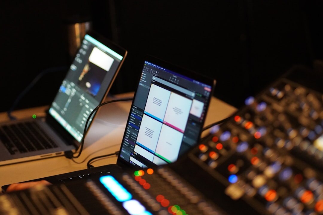 Broadcast control room with multiple screens showing live camera feeds