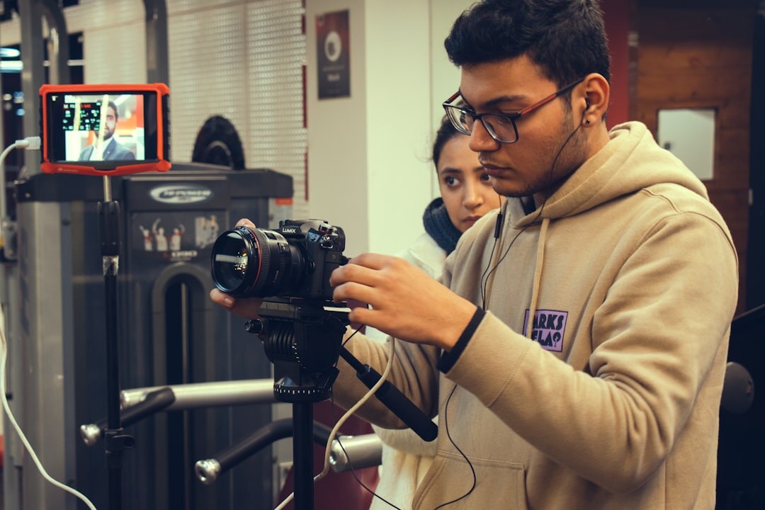 Training room with students practicing on a video switcher console