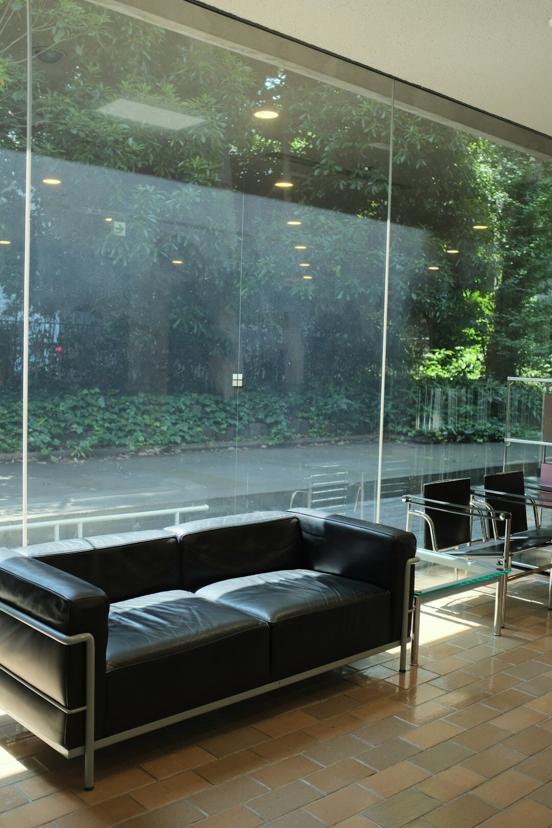 Modern media training center reception area with glass walls